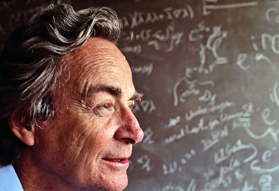 March 1983, Los Angeles, California, USA --- Nobel Prize winning physicist Richard Feynman stands in front of a blackboard strewn with notation in his lab in Los Angeles, Californina. --- Image by © Kevin Fleming/CORBIS